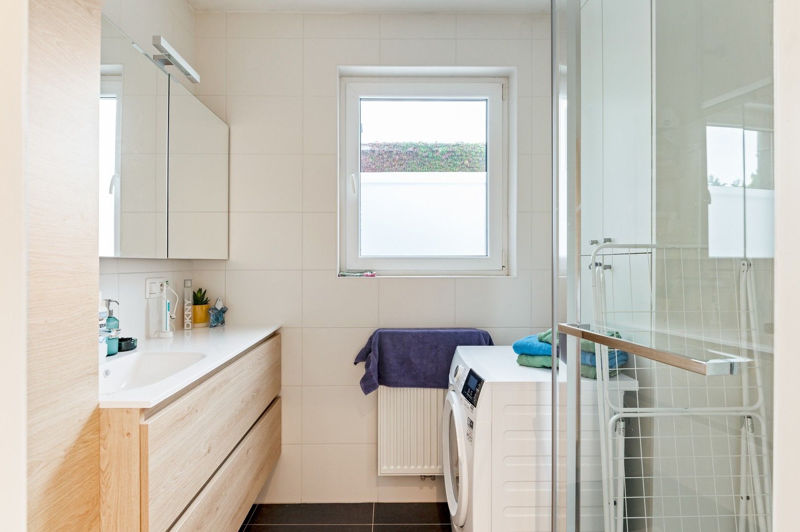 Recent instapklaar 2-slpk appartement in centrum Brasschaat foto 10