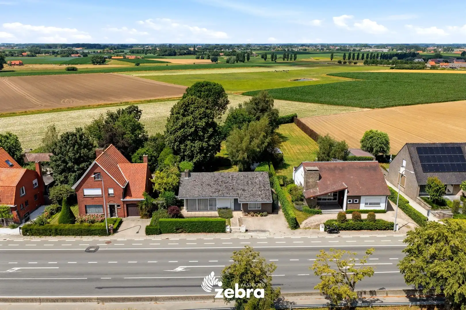 Te renoveren woning op een uitzonderlijk ruim perceel nabij het centrum van Tielt! foto 21