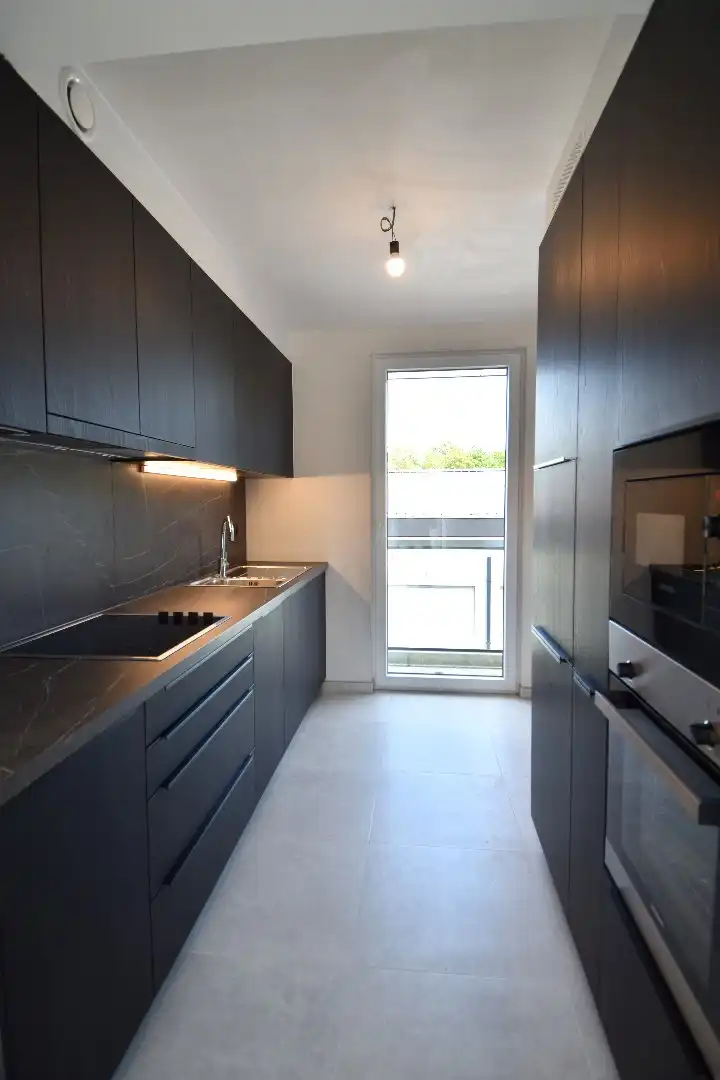 Appartement te koop met 2 slaapkamers en zonnige terras in Helkijn foto 6