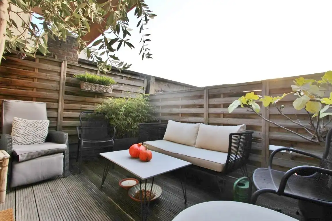 Gezellige triplex op toplocatie met 2 slaapkamers, terras en ondergrondse autostaanplaats foto 5