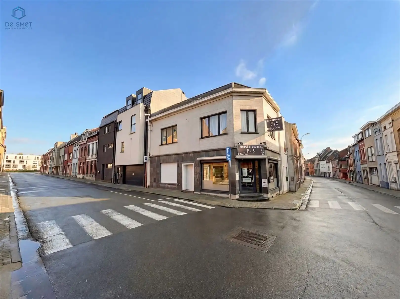 Hoofdfoto van de publicatie: OPBRENGSTEIGENDOM MET HANDELSPAND EN APPARTEMENT 