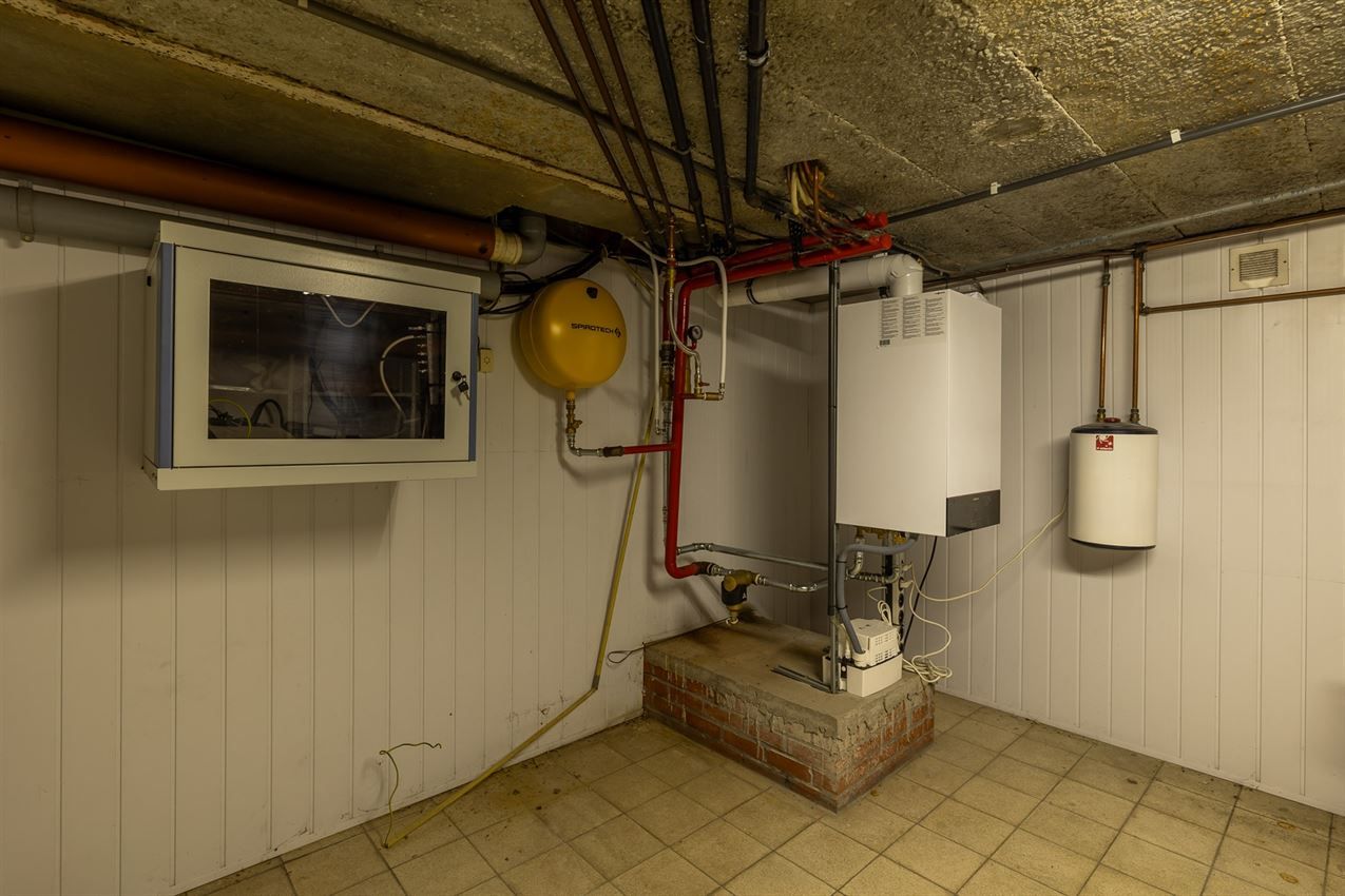 Verzorgd gebouw met handelszaak en 2 apt foto 54
