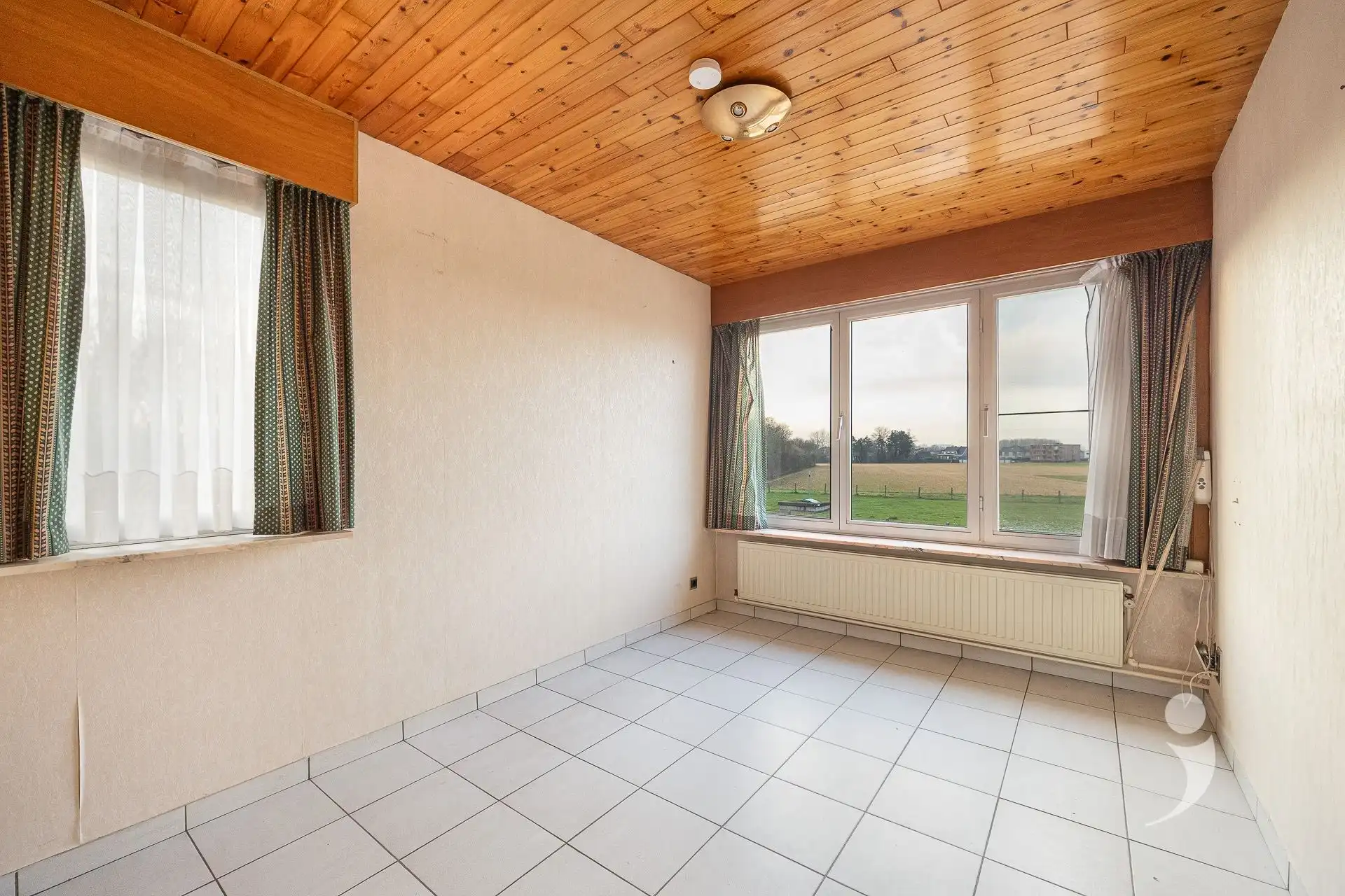 Te renoveren woning met zicht op de velden! foto 18