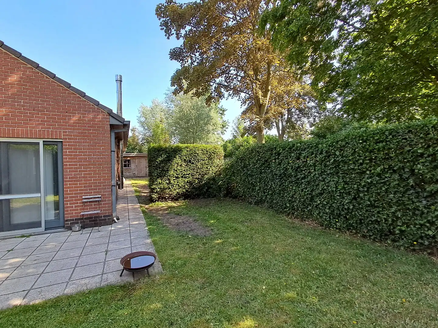 Ruime alleenstaande woning in een rustige wijk te Sijsele. foto 17