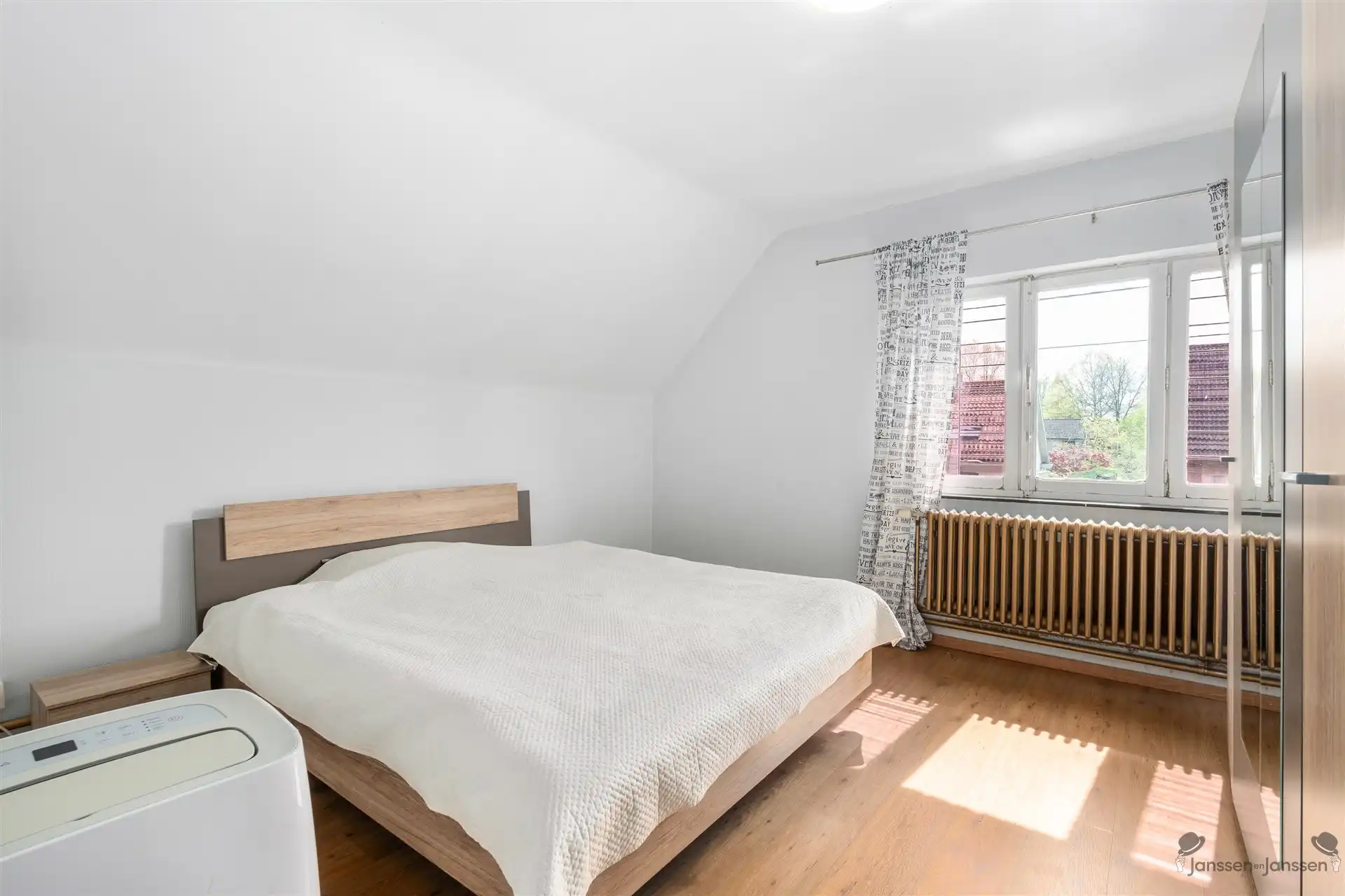 Vrijstaande woning met modern bijgebouw en renovatiepotentieel in groen Beverlo foto 13