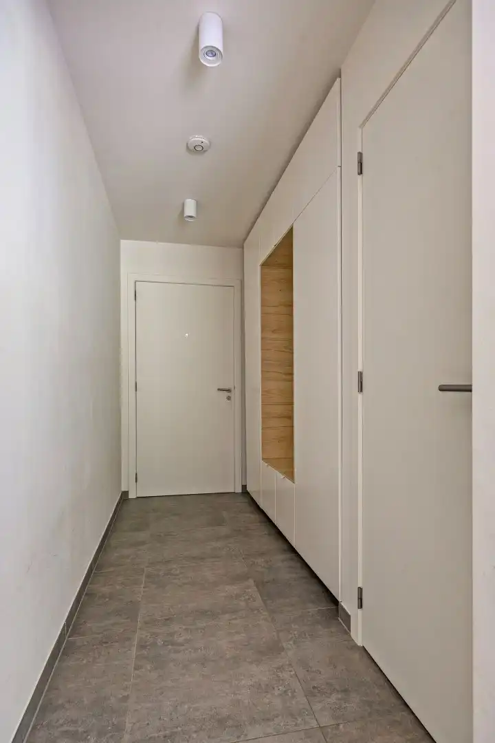 Ruim appartement met 2 slaapkamers en tuin + autostaanplaats vlakbij autostrade - EPC 68 kWh/m²  foto 4