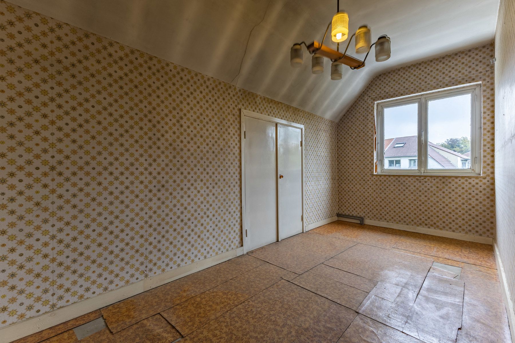 Gunstig gelegen te renoveren driegevelwoning foto 21
