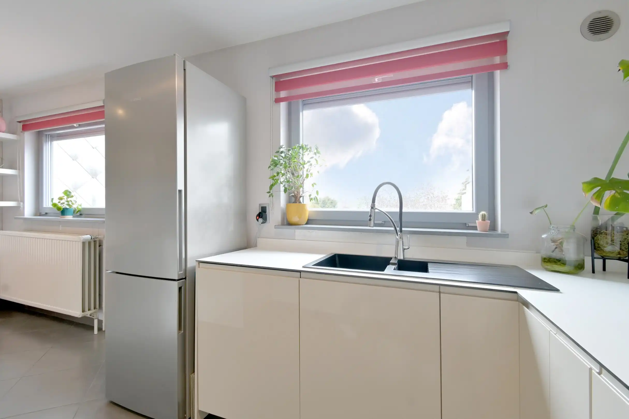 Instapklare gezinswoning met 3 slaapkamers, tuin én garage foto 16