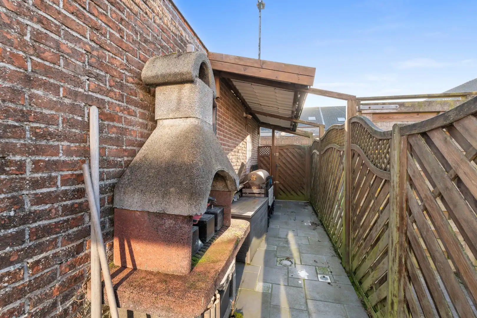 Charmante rijwoning met zonnig terras, wellnessruimte en garagebox in de Vicognewijk foto 19