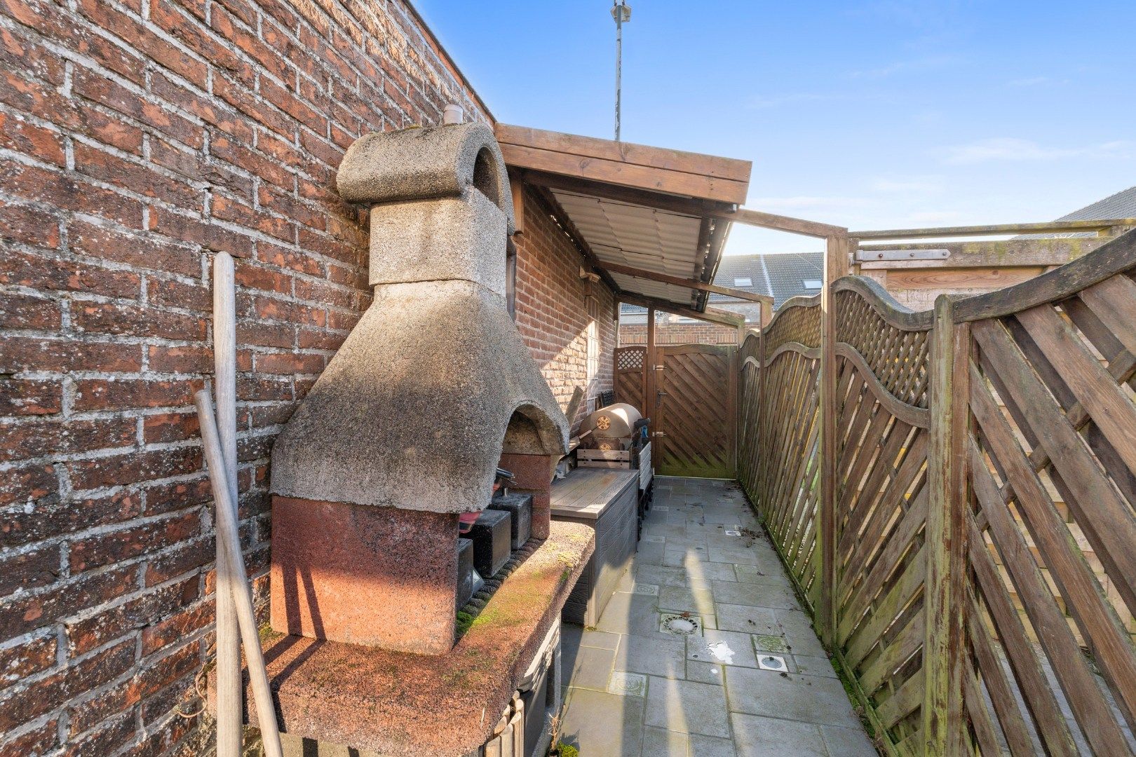 Charmante rijwoning met zonnig terras, wellnessruimte en garagebox in de Vicognewijk foto 19