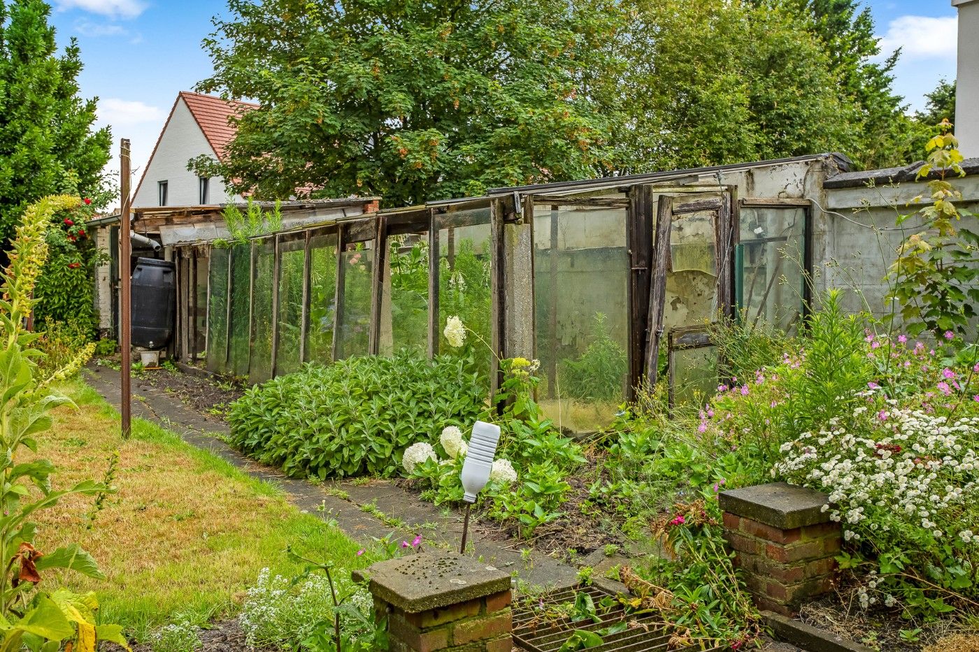 Authentieke, te renoveren woning met 4 à 5 slpk. en tuin foto 33