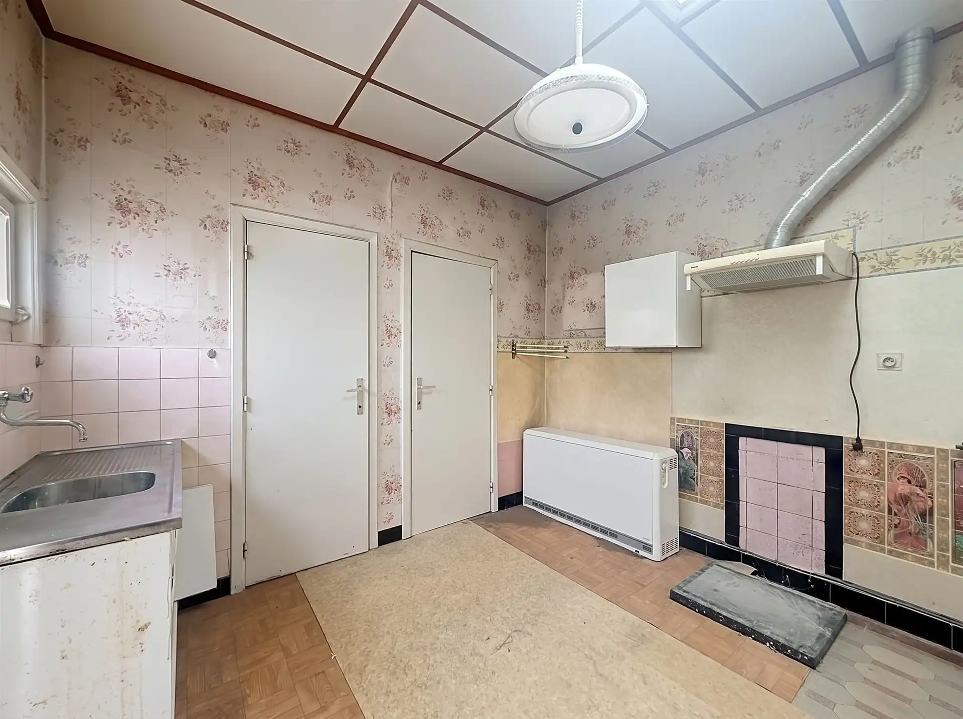 Leuke woning met veel potentieel, garage en tuin in het centrum van Beveren! foto 11
