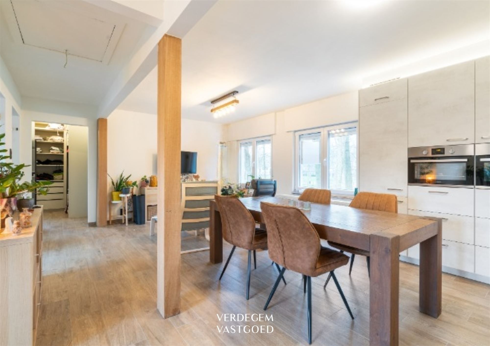 Wonen en werken op een unieke locatie: handelsgelijkvloers met appartement en tuin foto 16