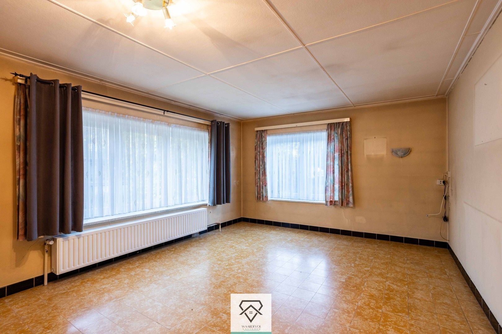 Opbrengsteigendom met 4 appartementen en 2 dubbele garageboxen te koop foto 7