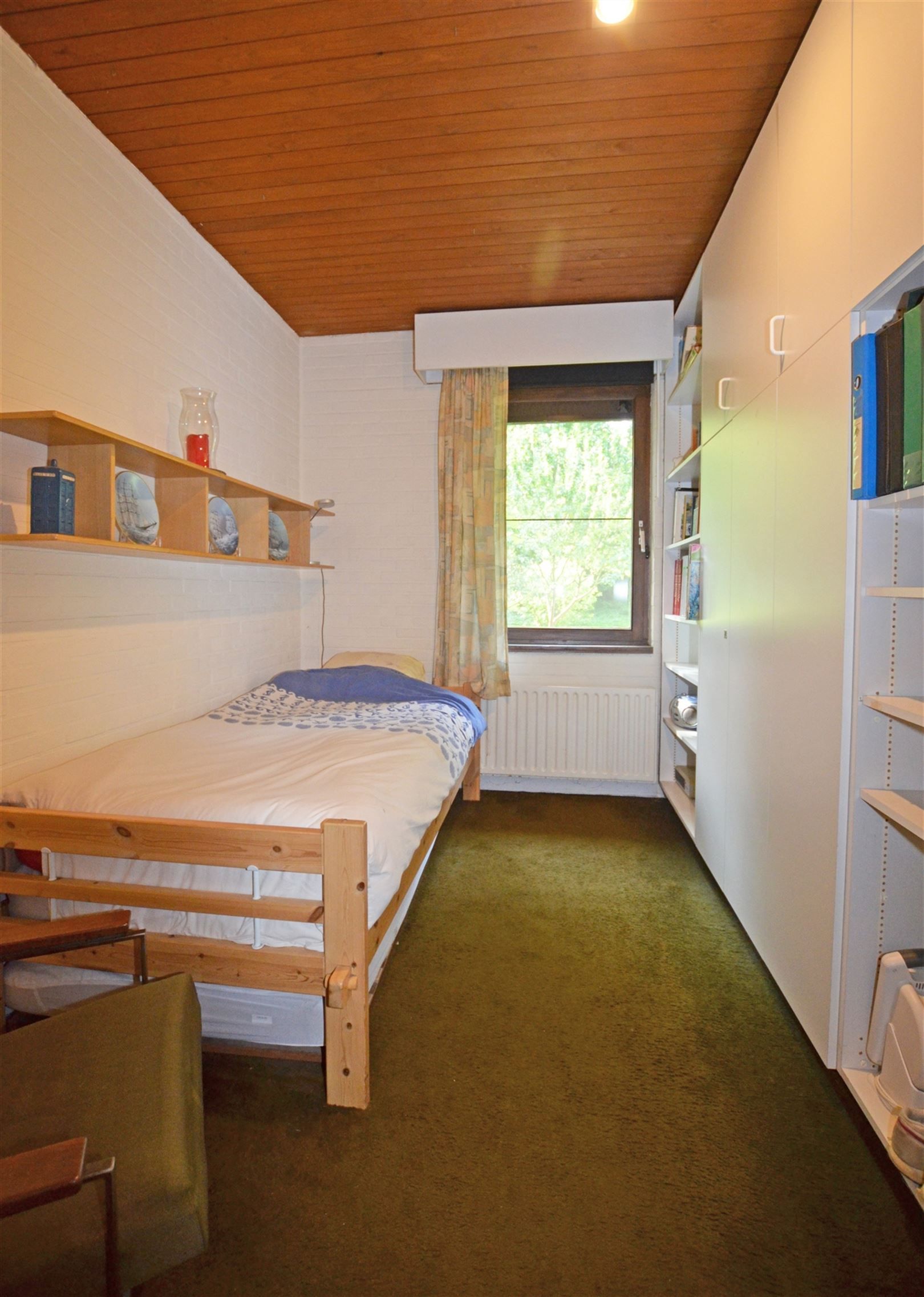 Gelijkvloerse gezinswoning in residentiële wijk foto 18