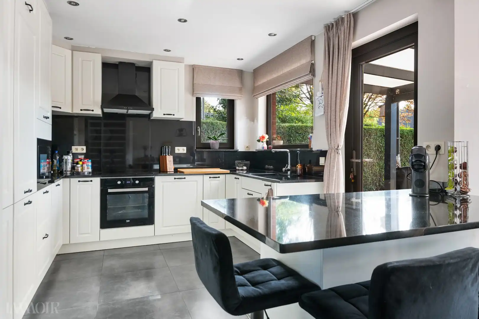 Charmante HOB met zuidgerichte tuin en garage in Brasschaat. foto 4