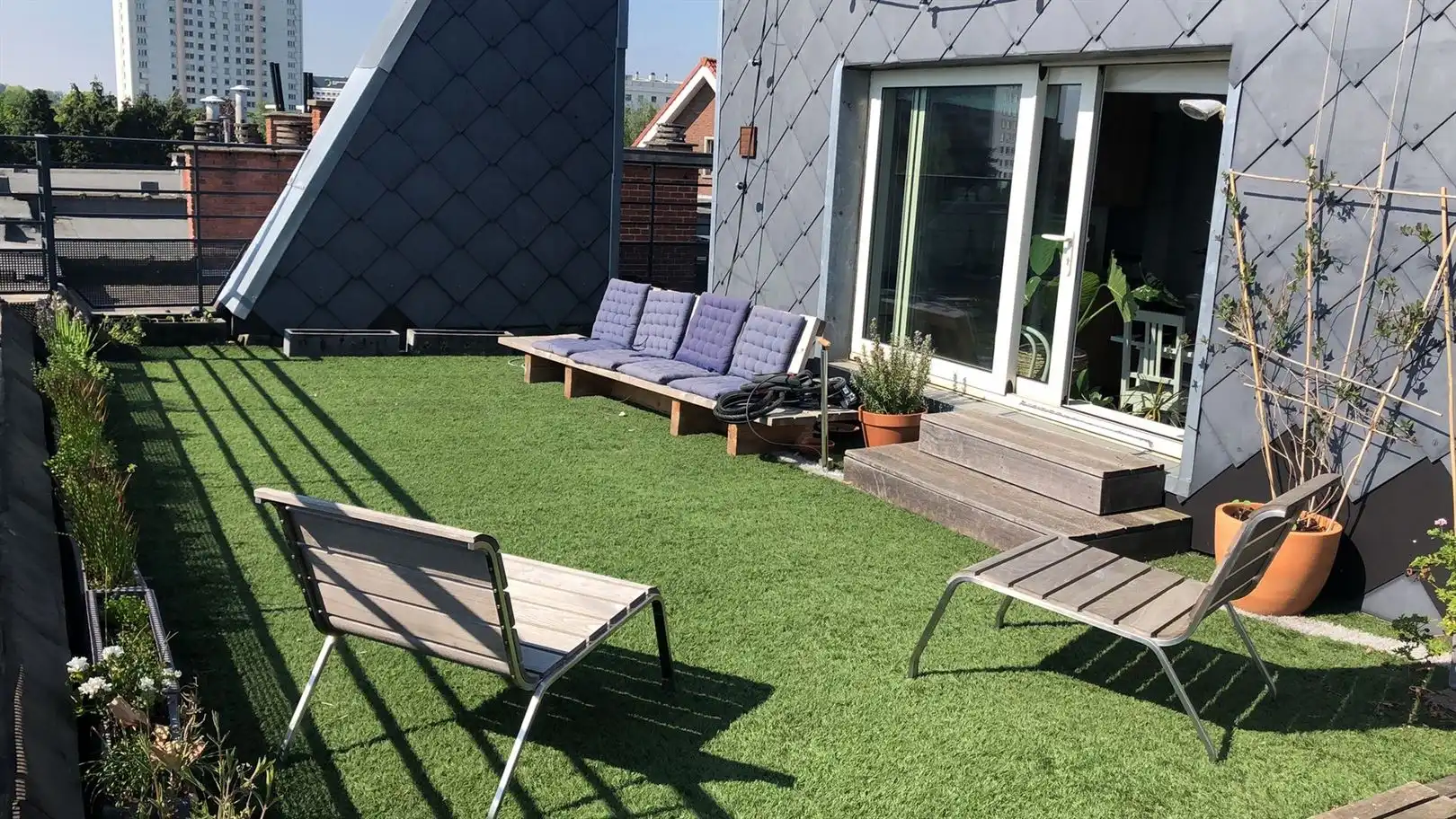 Prachtig dakappartement met 2 slaapkamers en heel groot terras. foto 10