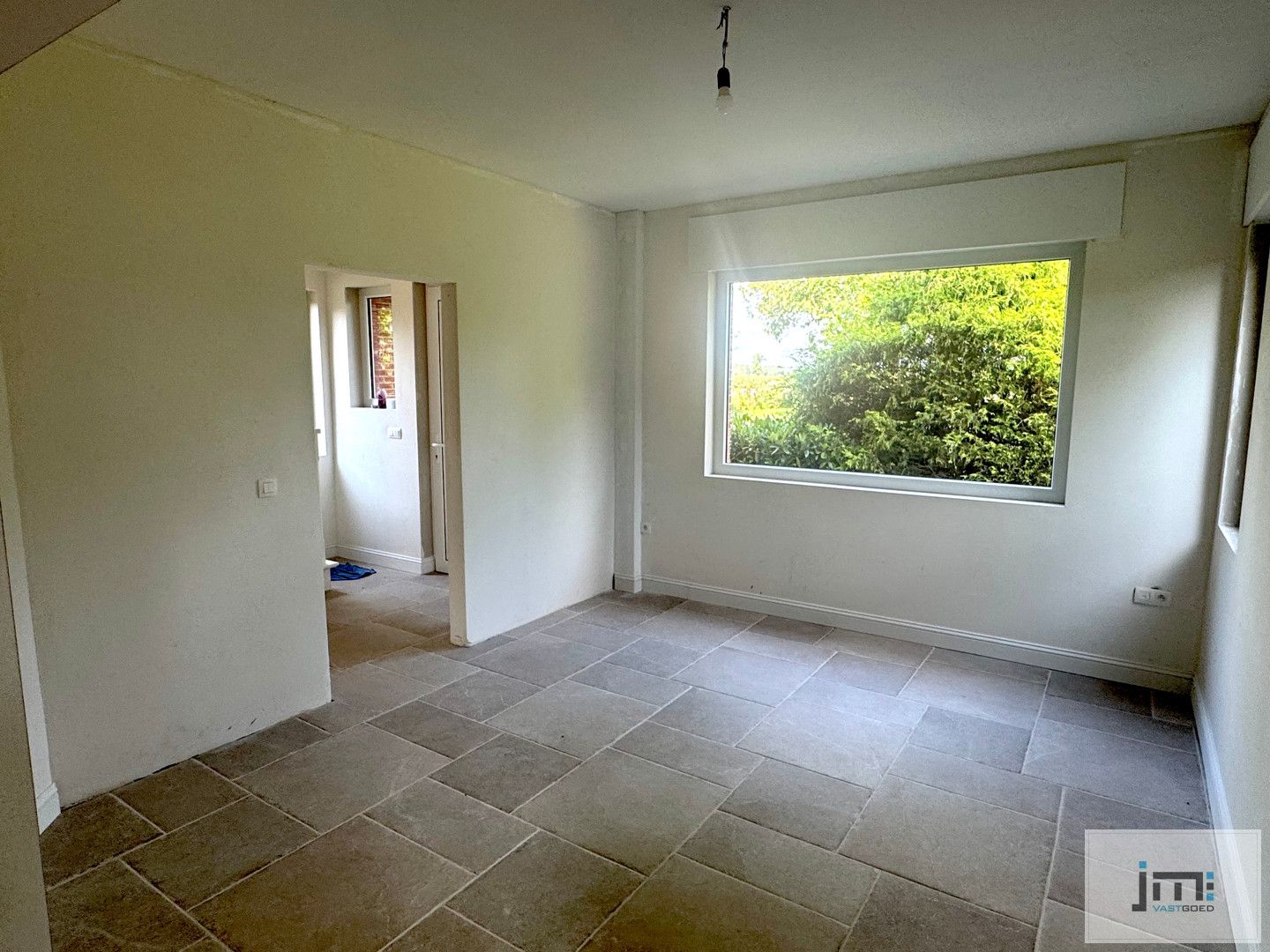Mooi gerenoveerde woning op ruim perceel foto 5