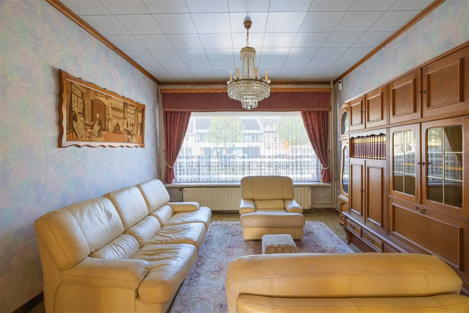 Te renoveren woning mét garage foto 3