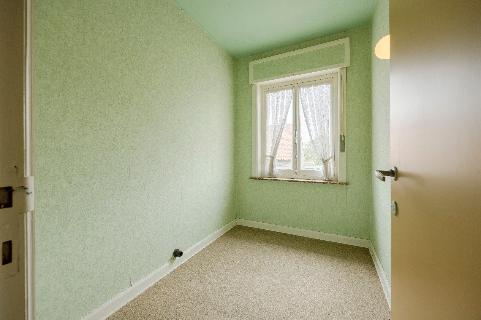 Kloeke halfopen woning op rustige locatie.  foto 14