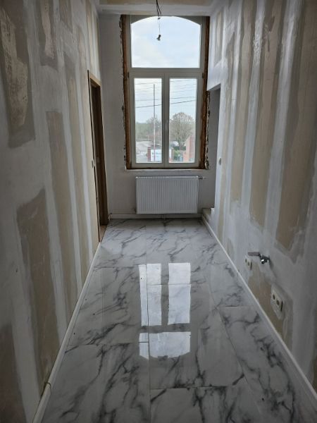Gerenoveerde woning met garage foto 11