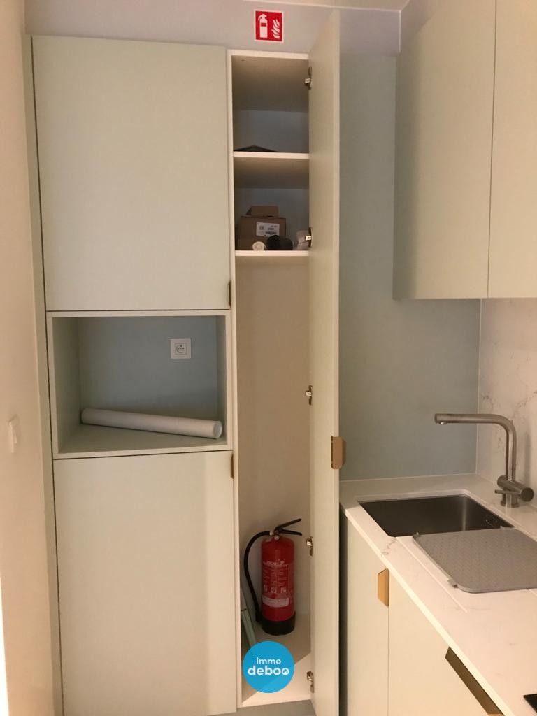 Ruime gerenoveerde studio met zonneterras op de zeedijk van Oostende foto 18