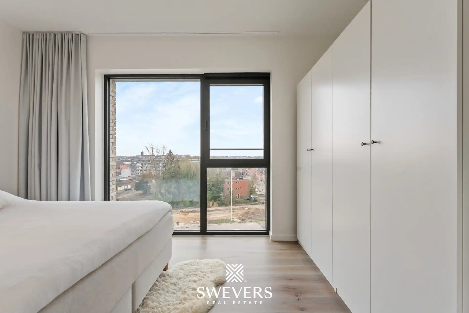 Luxueus, energiezuinig appartement met zonnig terras met skyline in centrum Hasselt  foto 14