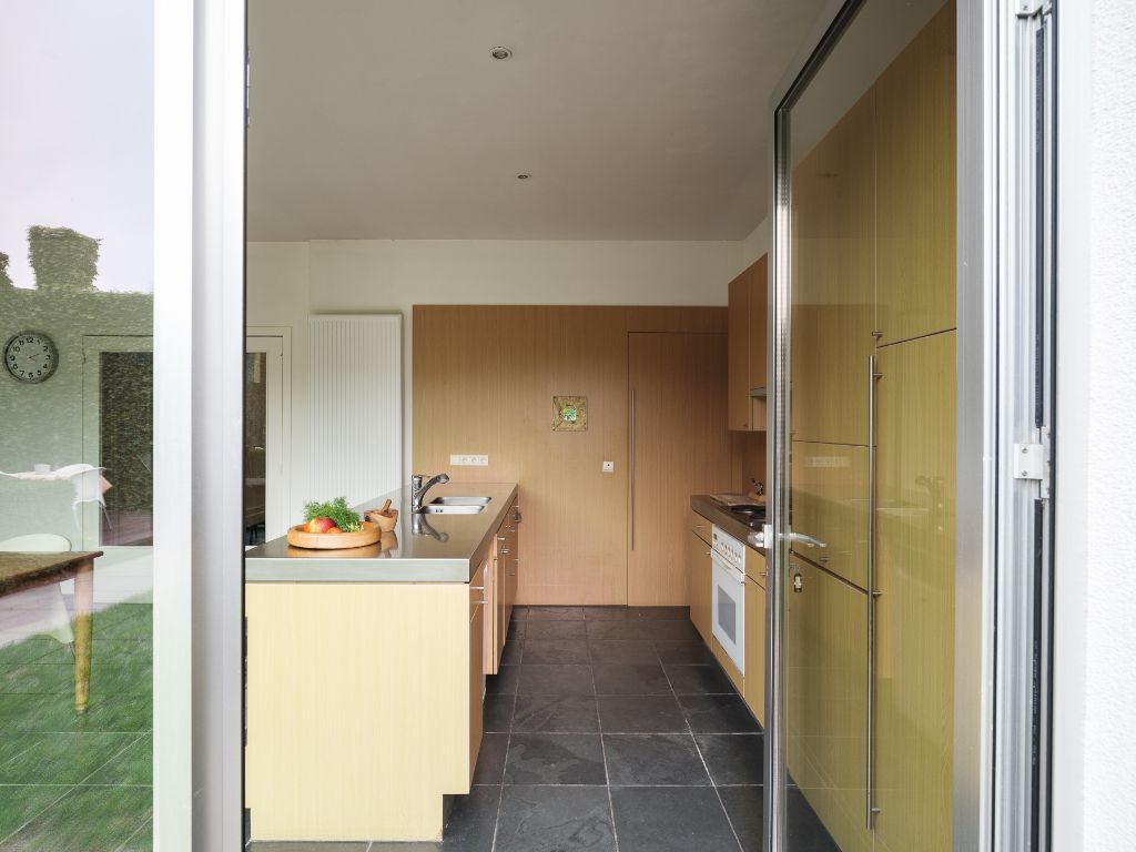 Bijzonder ruime & karaktervolle burgerwoning met zonnige stadstuin en extra bijwoonst in een hippe en opkomende buurt nabij Dok Noord. foto 14
