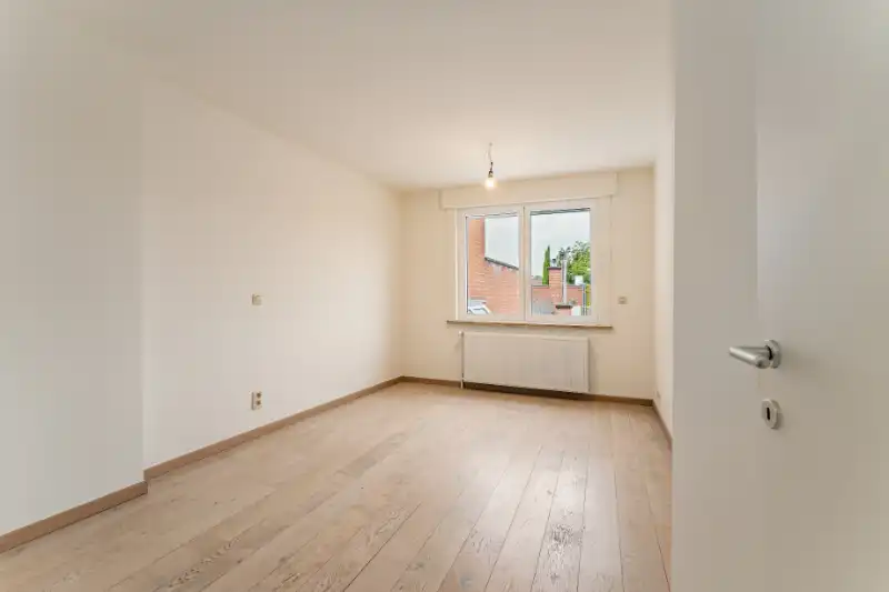 Genoveerd appartement met drie slaapkamers en groot terras foto 8