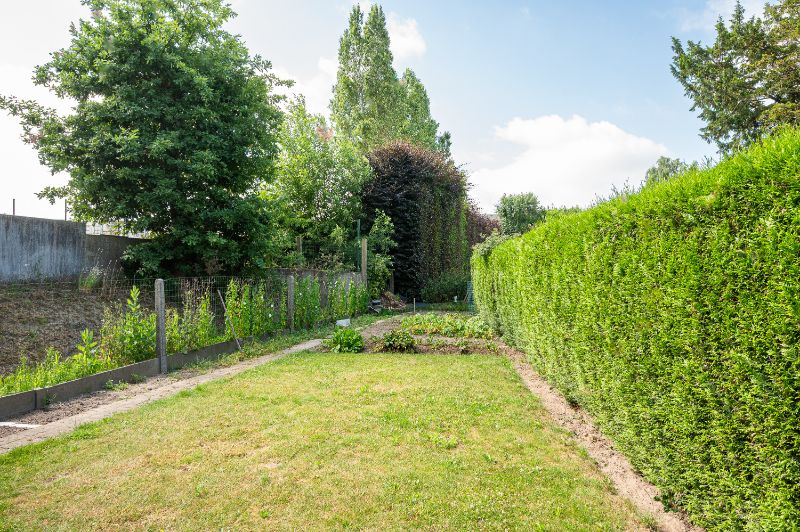 Goed onderhouden woning met zonnig terras en leuke tuin foto 7
