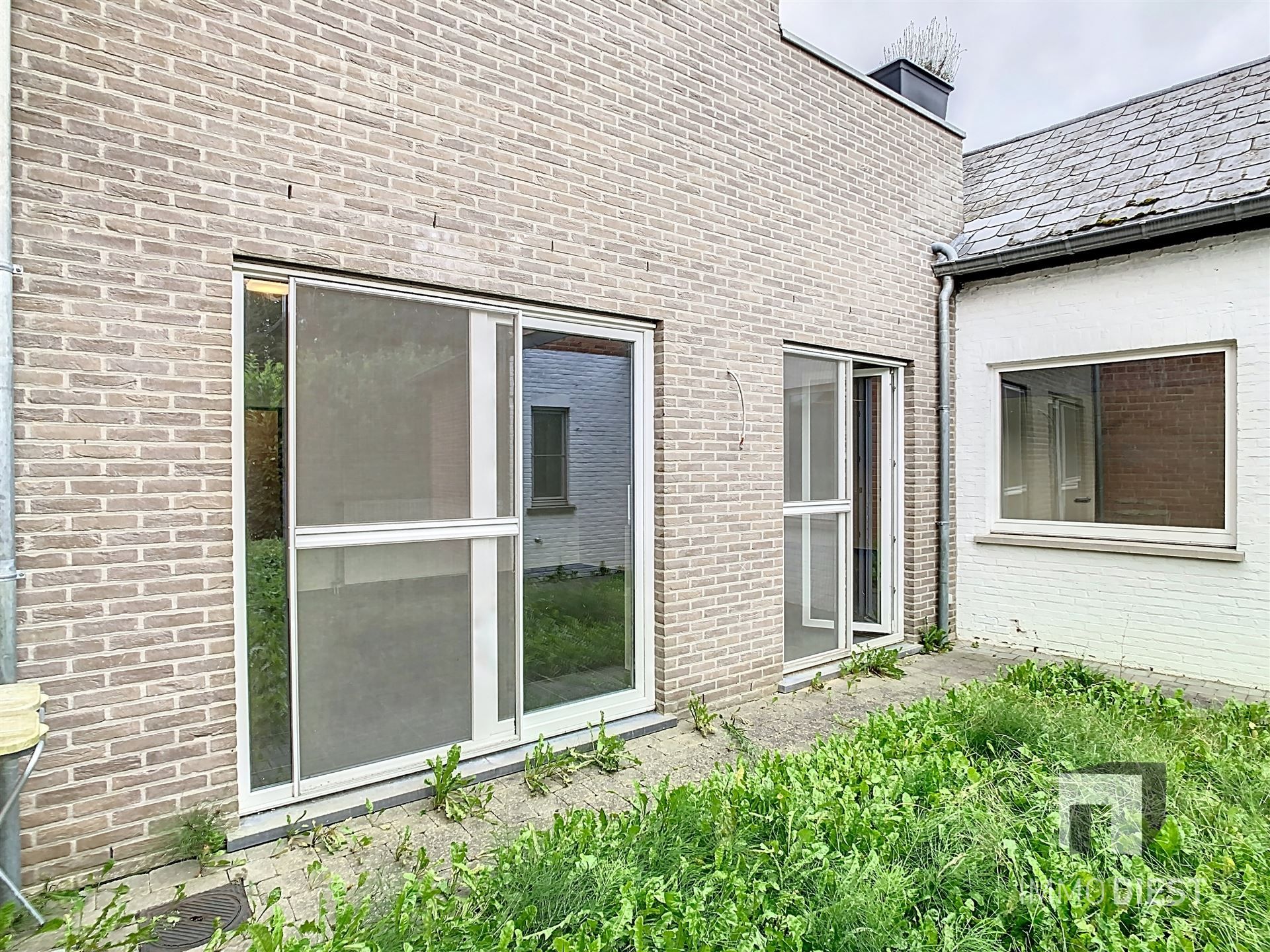 Ruim gelijkvloers appartement met tuin en 3 staanplaatsen foto 20