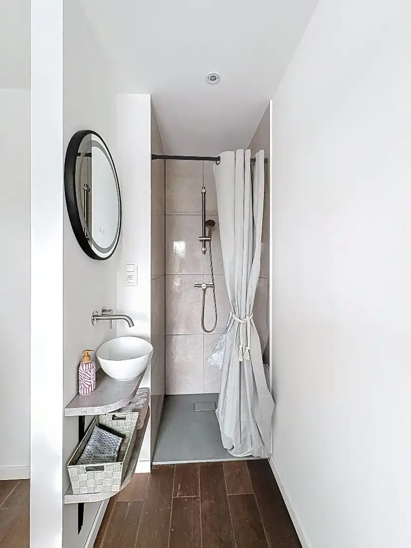 Elegant wonen in Tienen: gerenoveerde rijwoning met 3 slaapkamers en zuidwestgerichte tuin. foto 12