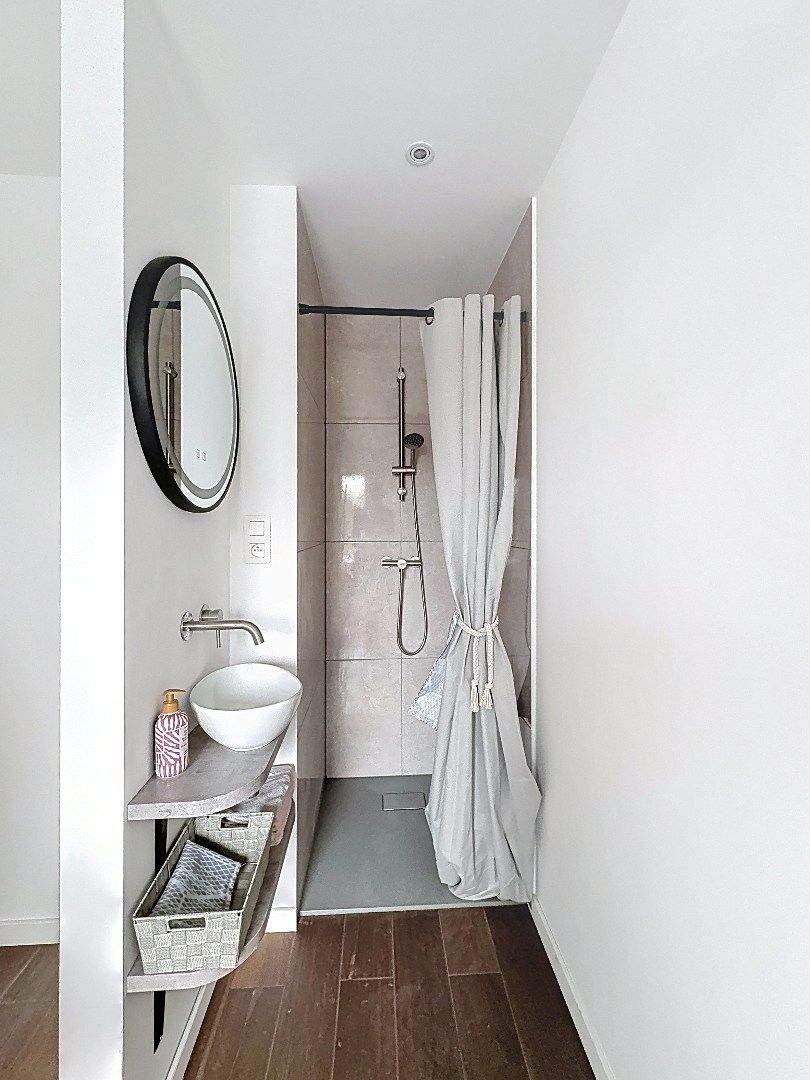 Elegant wonen in Tienen: gerenoveerde rijwoning met 3 slaapkamers en zuidwestgerichte tuin. foto 12