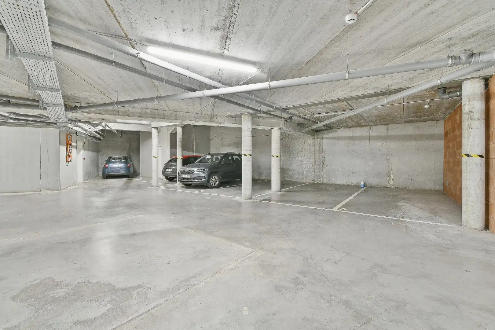 Ondergrondse parkeerplaatsen te koop in het centrum van Gistel foto 4
