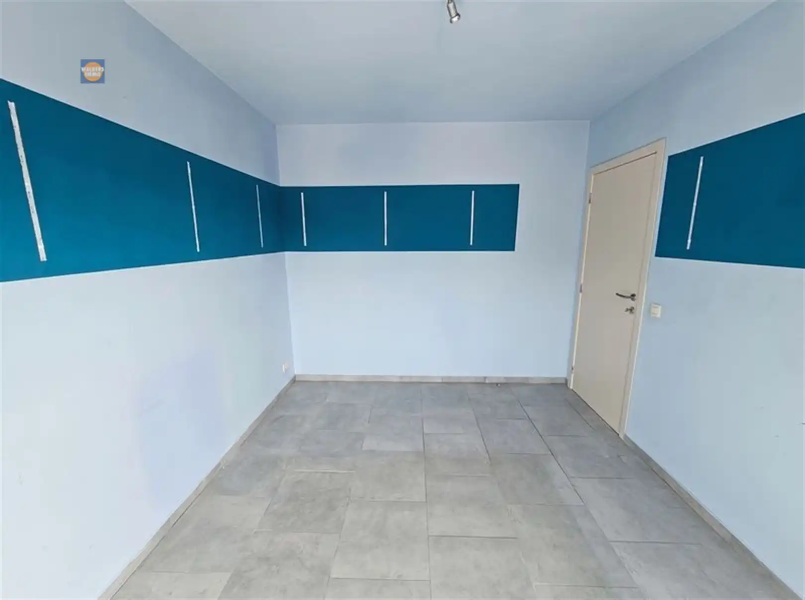 Instapklaar 1-slaapkamerappartement met kelderberging in centrum Willebroek foto 7