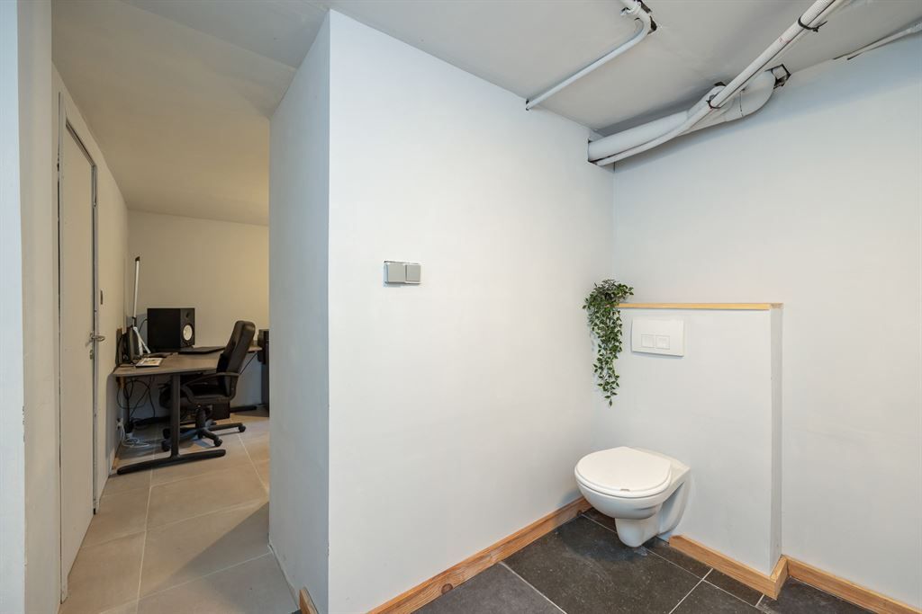 Gelijkvloers appartement met tuin en garage foto 20