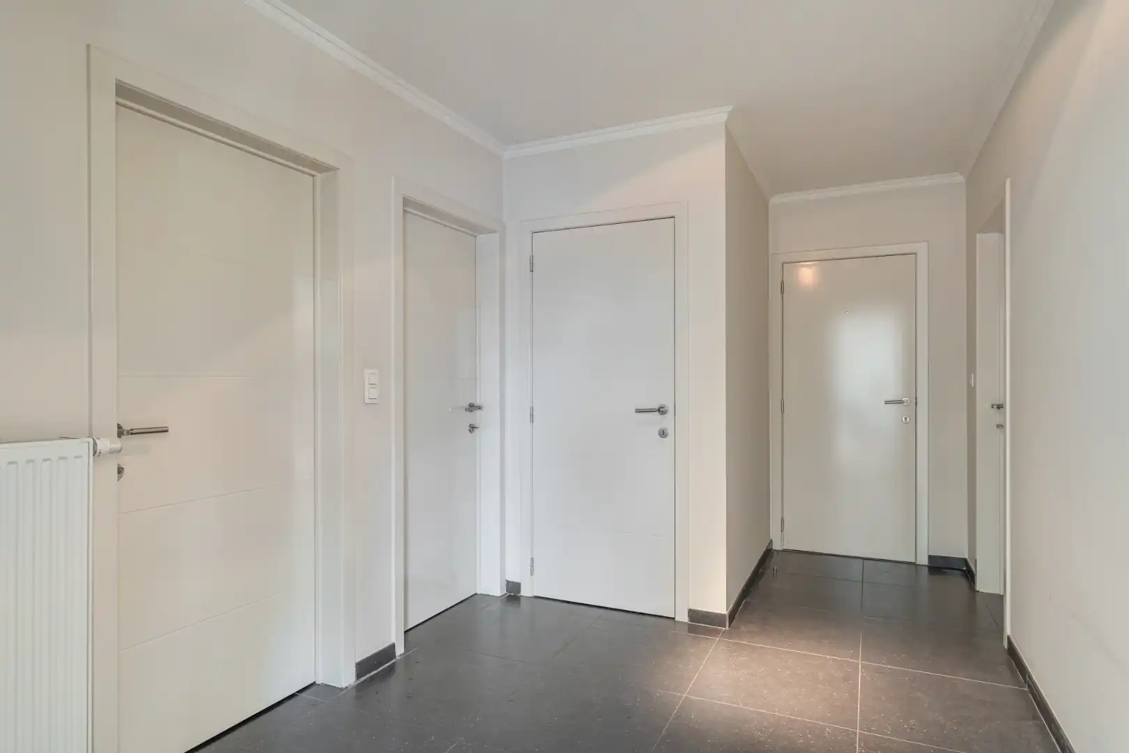 Exclusief penthouse met ruim terras, 2 slpk, extra brede autostaanplaats, centrum Houthalen foto 22