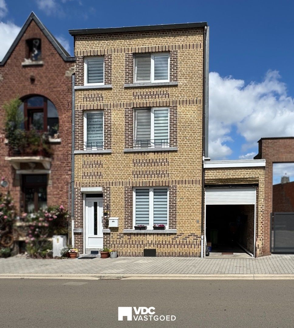 Klassevolle stadswoning met garage en groene stadstuin in het hart van de stad foto {{pictureIndex}}