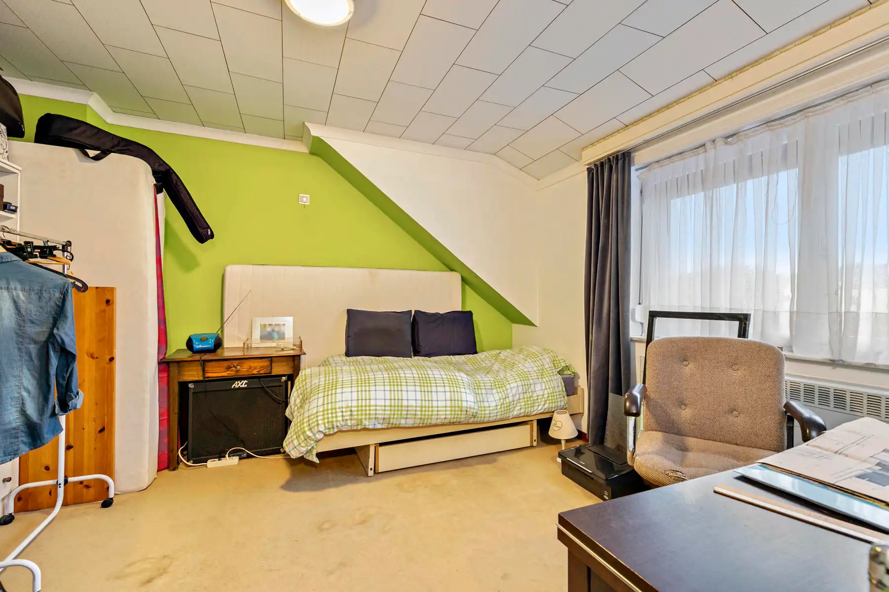 In de dorpskern van Neeroeteren gelegen halfvrijstaande woning met 2 slaapkamers. foto 21