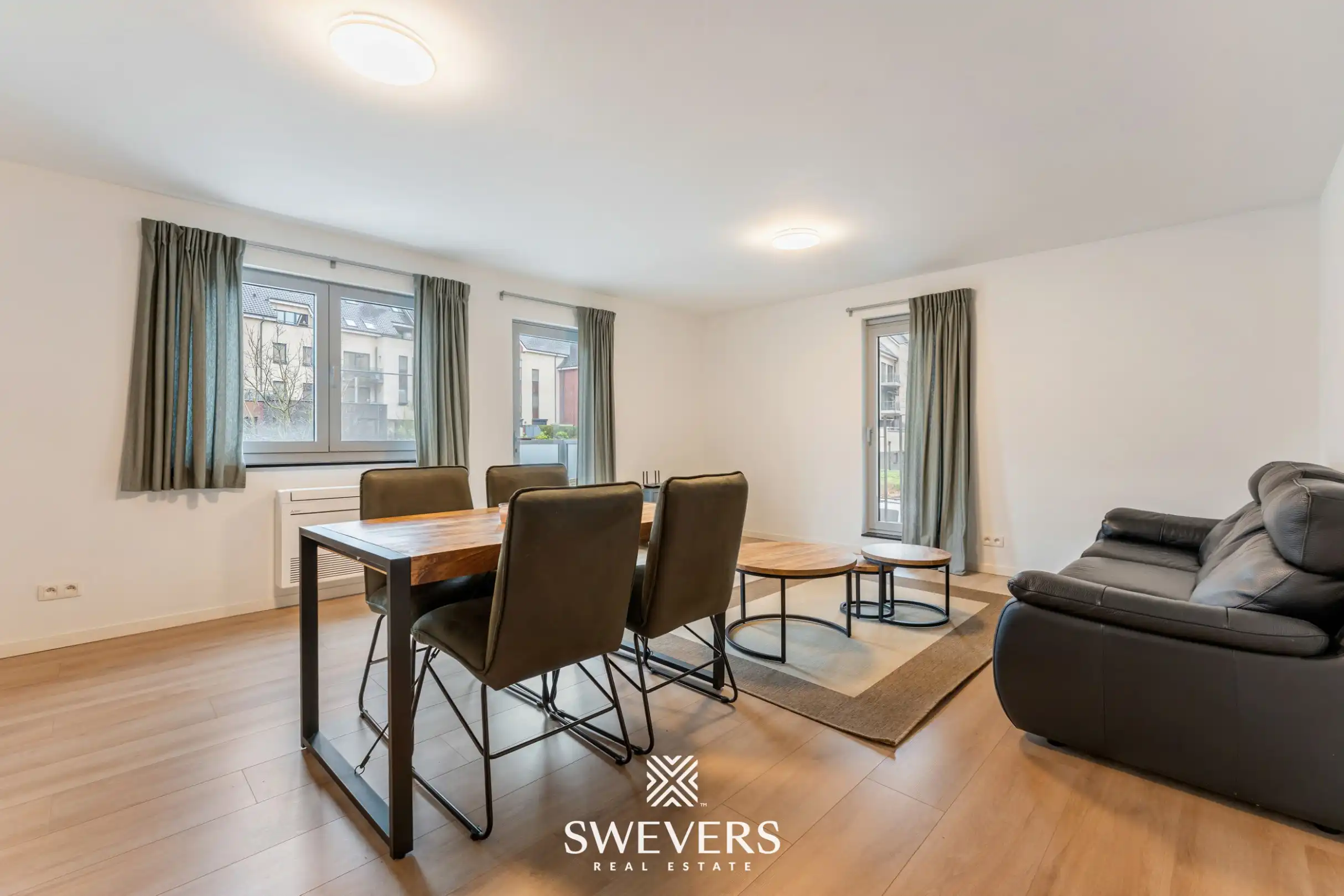 Modern en instapklaar appartement in hartje Genk met uitstekende investeringsopportuniteit foto 4