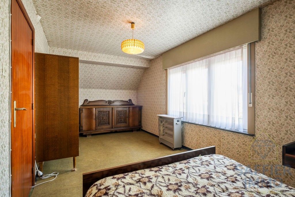 Ruime woning met loods op een perceel van 2200m². foto 22