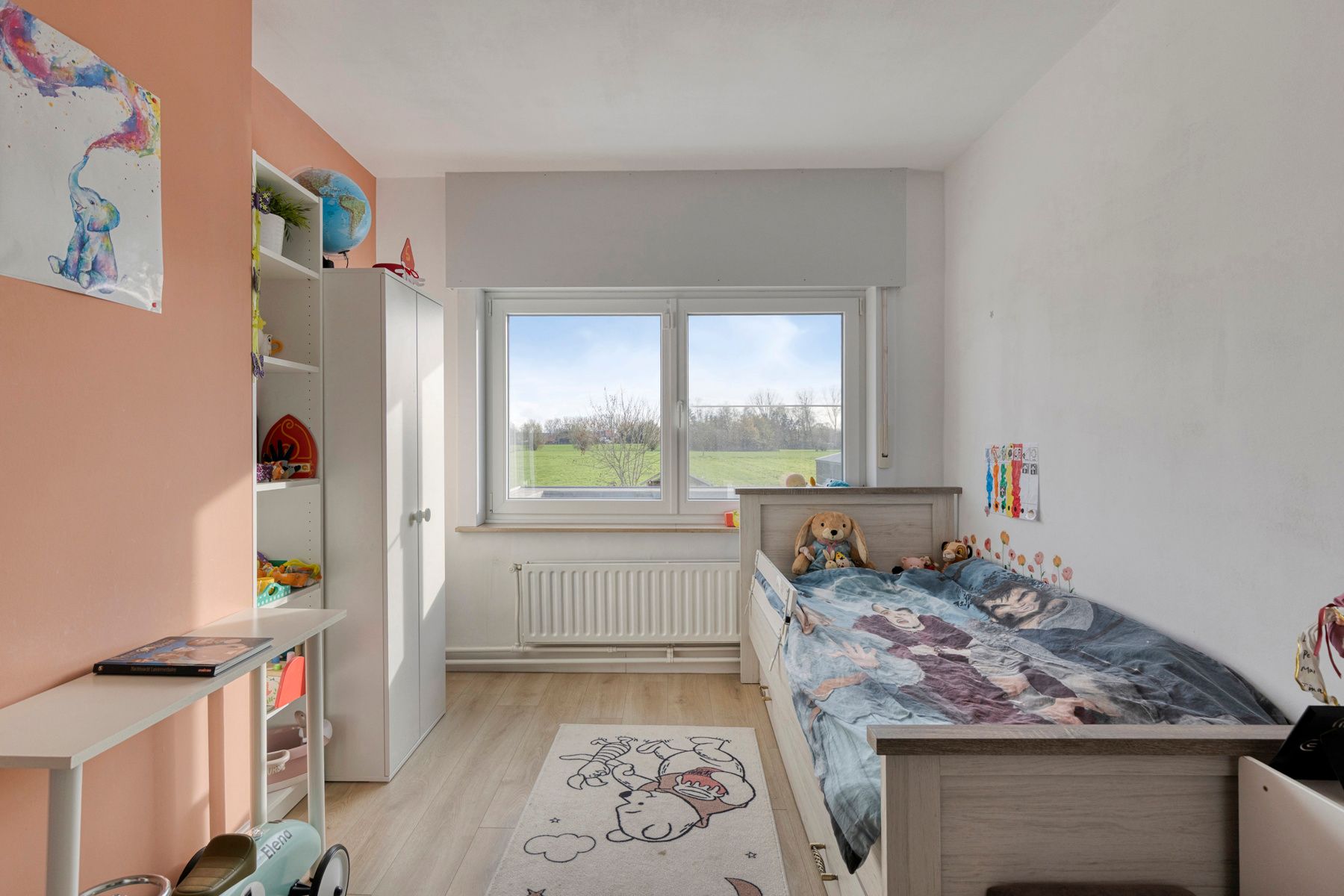 Instapklare woning met 3 slaapkamers, garage en tuin! foto 13