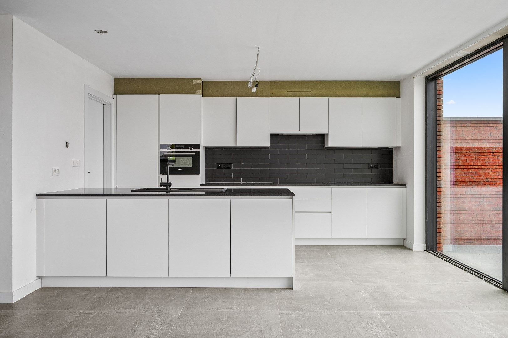 Nieuwbouw halfopen bebouwing (EPC A) met tuin, terras en garage foto 10
