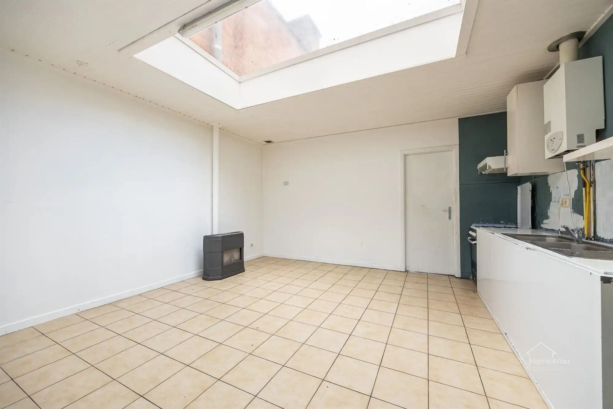 Te renoveren woning met 2 woonentiteiten + tuin foto 8