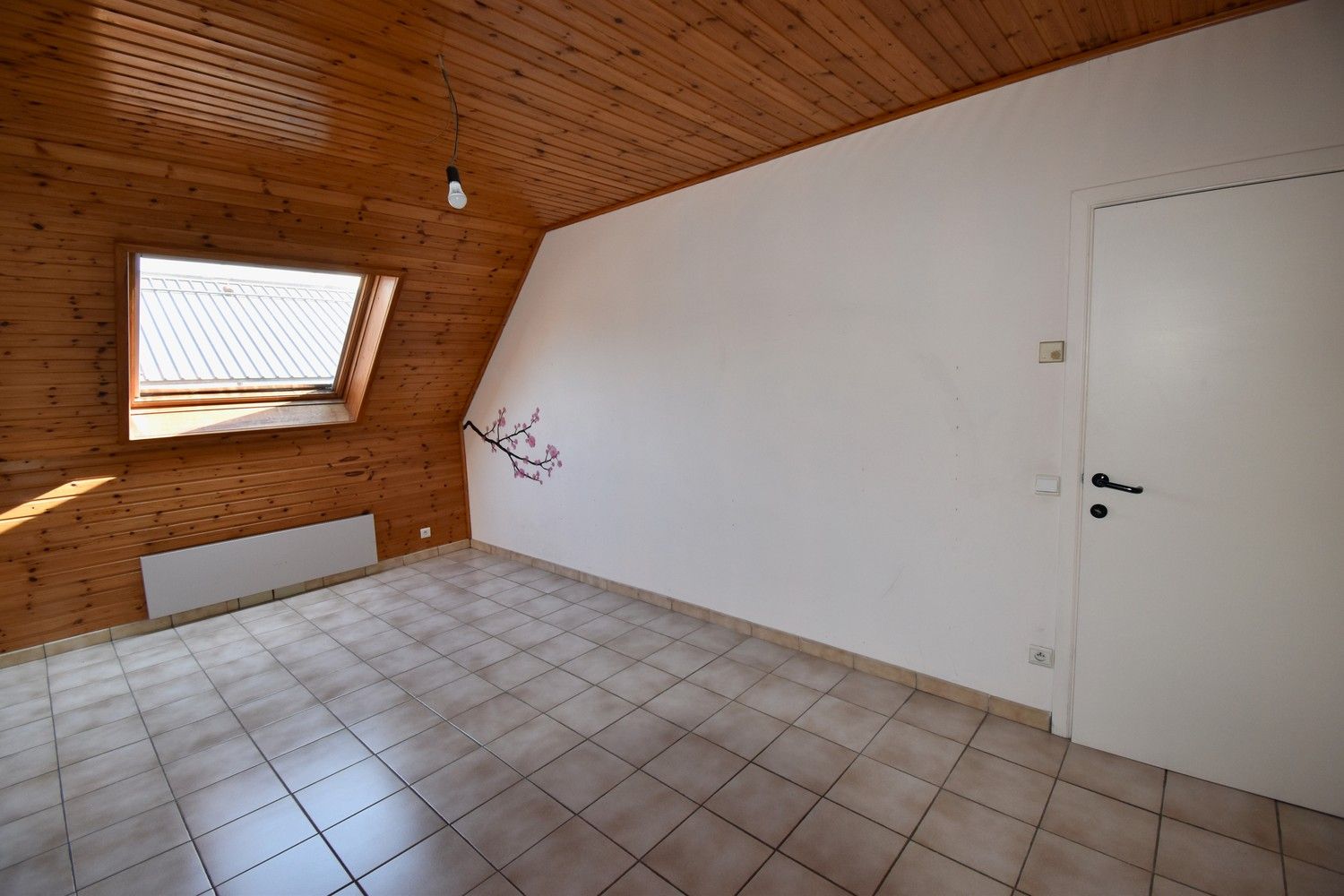 Polyvalent gebouw bestaande uit winkelruimte, appartement en loods foto 13