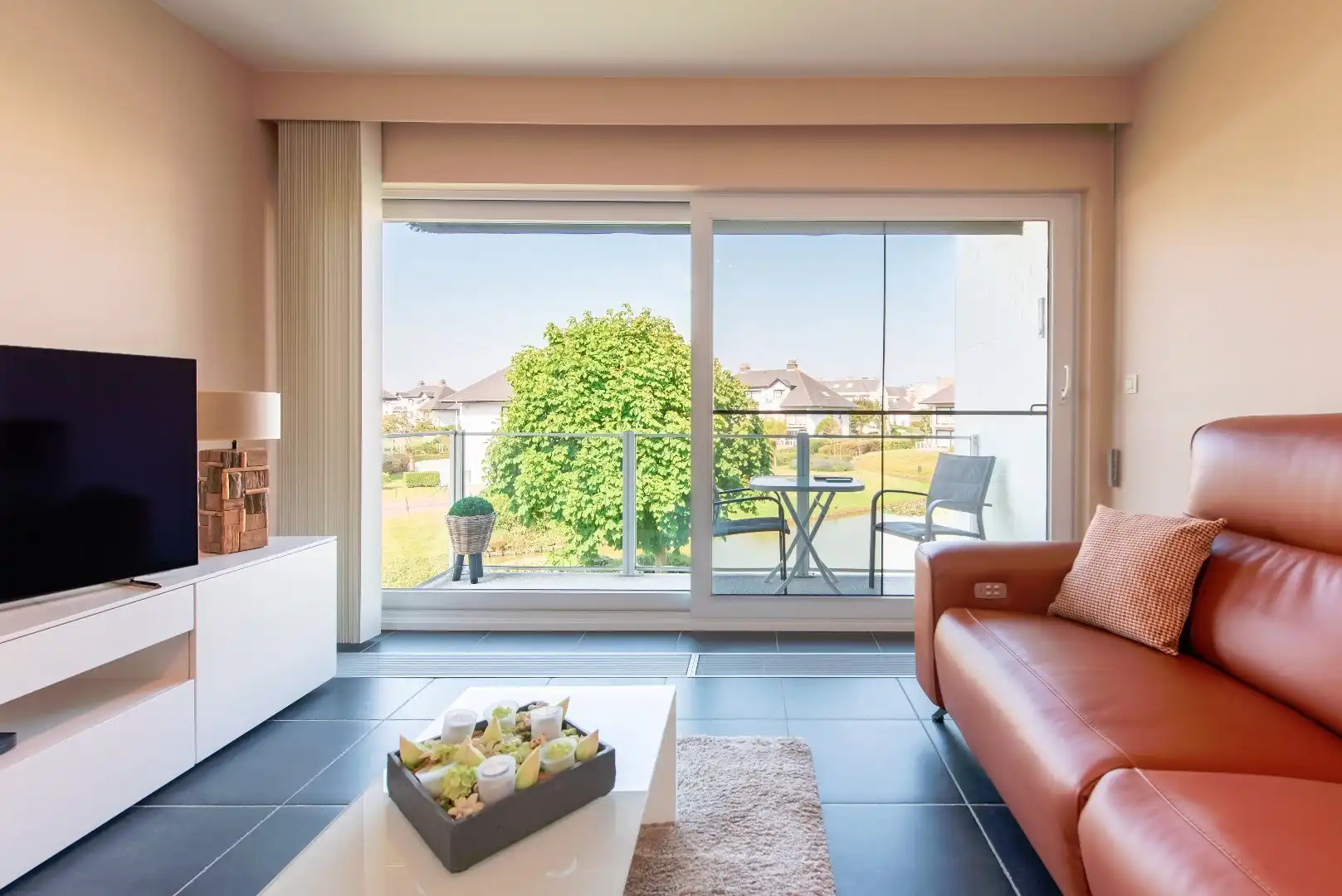 Aangenaam appartement in groene omgeving met zonneterras foto {{pictureIndex}}