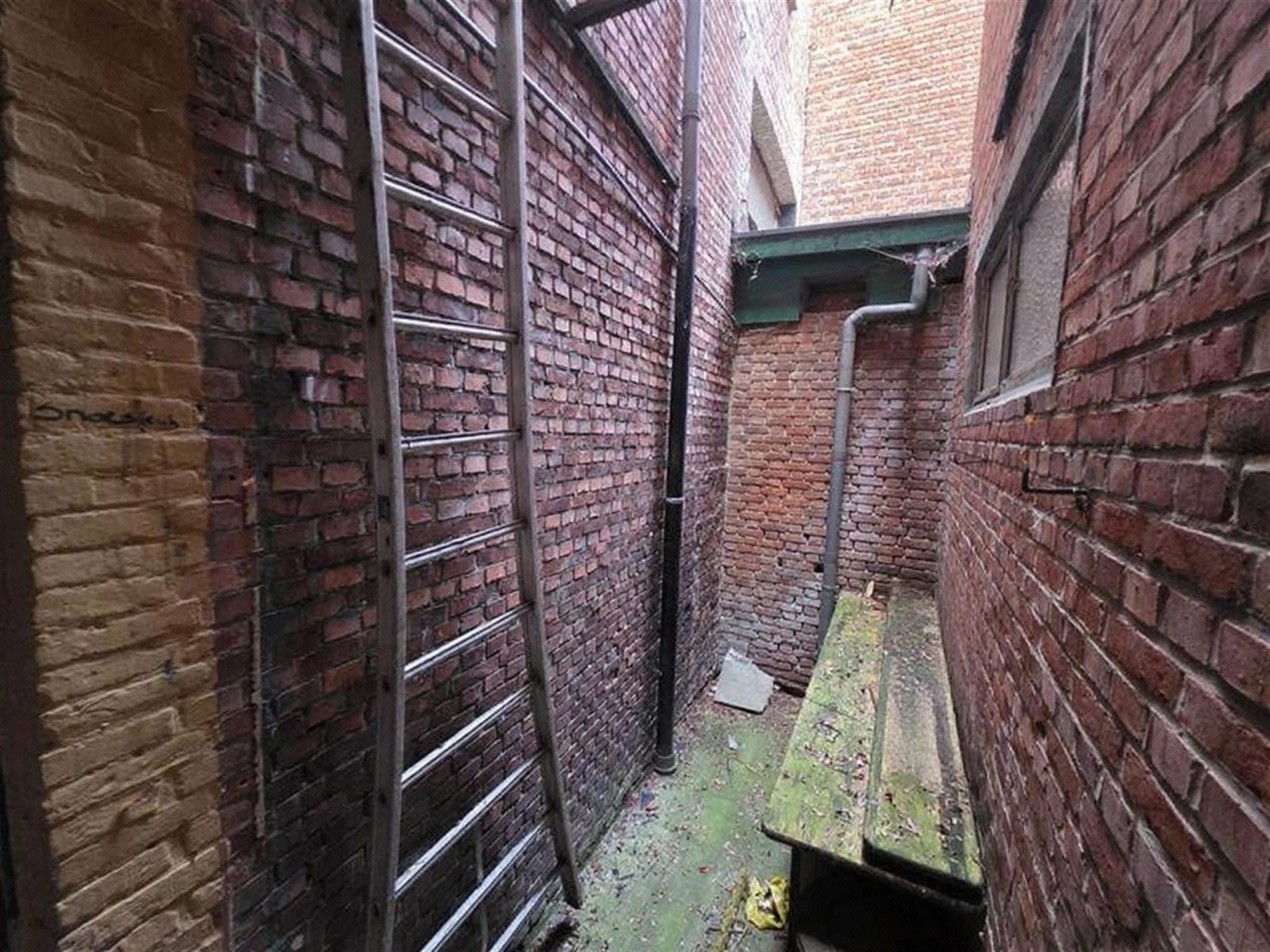 Een stadswoning met klasse én commerciële troef foto 32