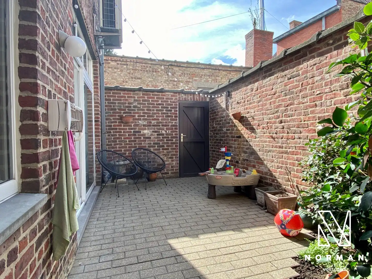 Gelijkvloers appartement met 2 slaapkamer, terras en garage in centrum van Gullegem foto 2