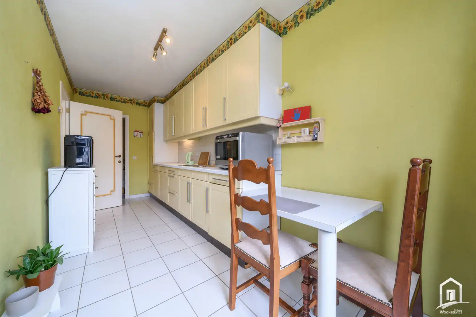 Ruim en lichtrijk appartement met garage in het hart van Denderhoutem! foto 4