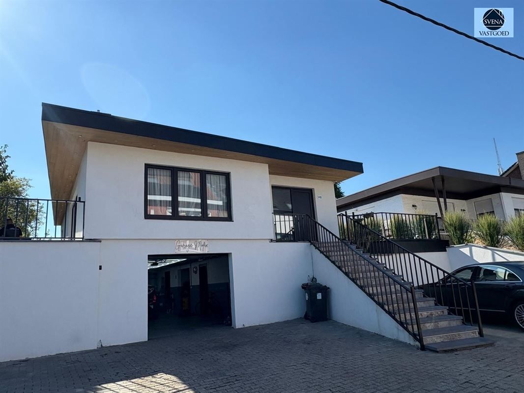 WONING MET HANDELSRUIMTE EN 3 SLAAPKAMERS foto 16